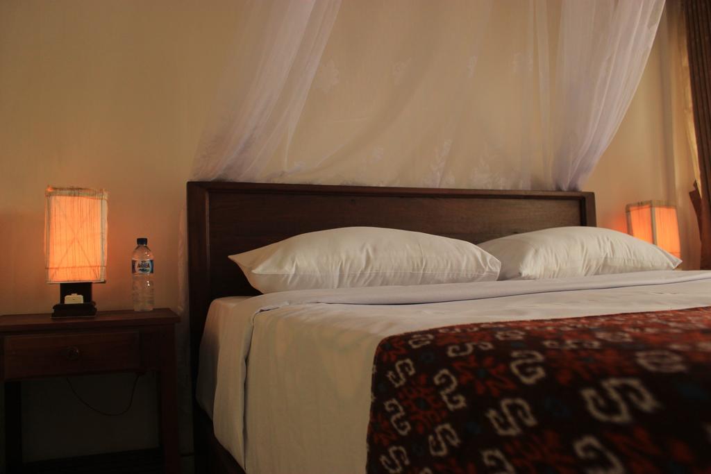 Maliana Homestay Мундук Номер фото